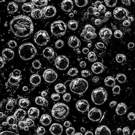 Beautiful Close-up on air bubbles stuck in frozen waterの写真素材