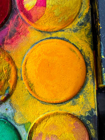 Colorful Watercolor paint palette set in circles dirtyの写真素材