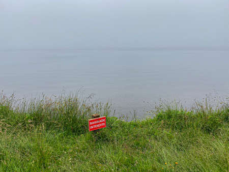 no swimming sign in french - baignade interdite - Servieres lake, auvergneの写真素材
