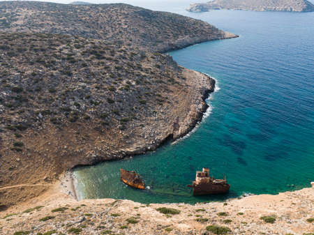 aerial drone view of Shipwreck Olympia boat in Amorgos island during summer holidays, at the coastal...