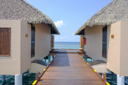 Just down the street from the water bungalow colony to see the sea and sky combine in beautiful, clear colours. Maldives Islands.の写真素材