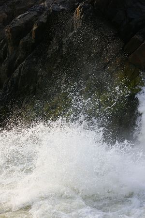 spread water with rock at 4000 islands in laos