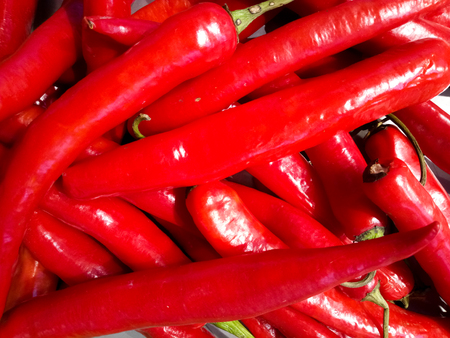 The Red peppers background texture of red pepper in the kitchen