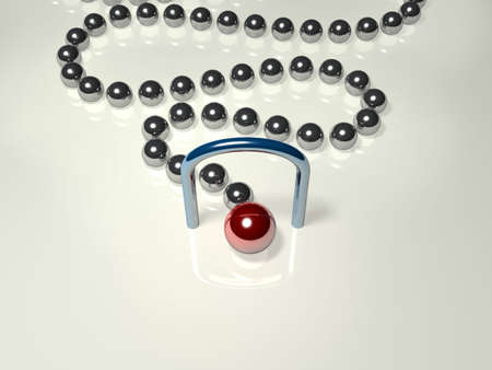 Chrome balls are placed in a queue going trough a gate. The first ball is red. It is the leader.の写真素材