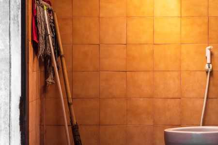 Old bathroom background with cleaning Equipment. Dirty bathroom.の写真素材
