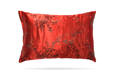 Silk pillow in china style on isolated background with  . Elegant headboard for montage or your design.の写真素材