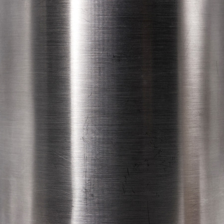 Brushed steel plate texture. Hard metal material background. Reflection surface.の写真素材