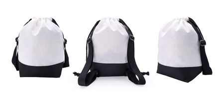 White fabric bag and rope on isolated background with clipping path. Blank fashion backpack for montage or your design.の写真素材