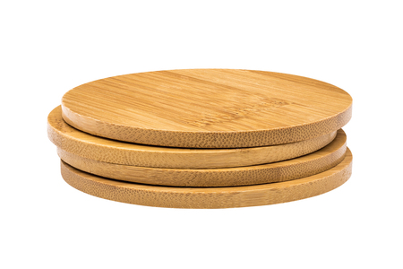 Set of ceramic beverage coaster isolated on white background. Wooden pad for put your mug.の写真素材