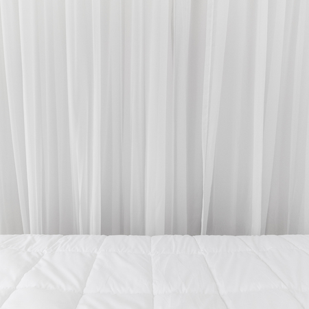 Bedding backdrops. White curtains fabric background.の写真素材
