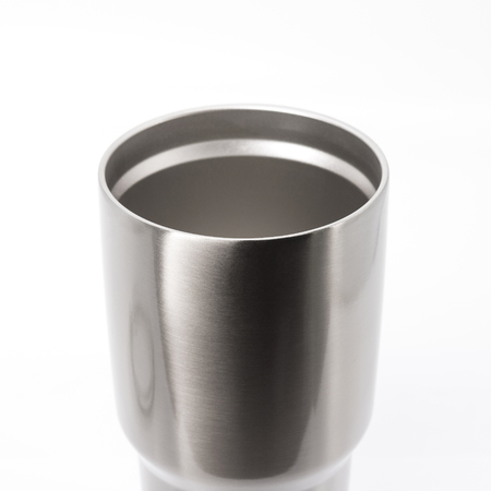Steel mug on white background. Large water bottle for keeping temperature. Top of stainless cup for your design.の写真素材