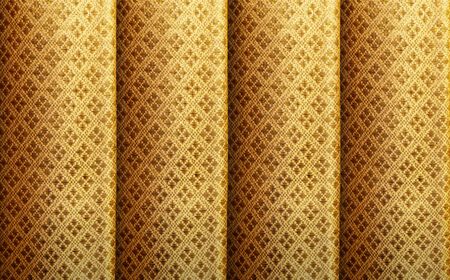 Golden silk with vintage royal pattern background. Luxury weave texture made from thai silk.の写真素材
