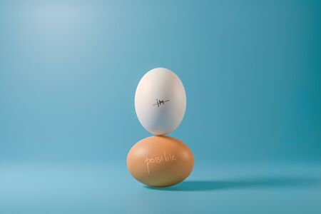 Impossible of two eggs stack on a light blue background with possible word. Minimal creative idea concept. Realistic 3D render.の写真素材