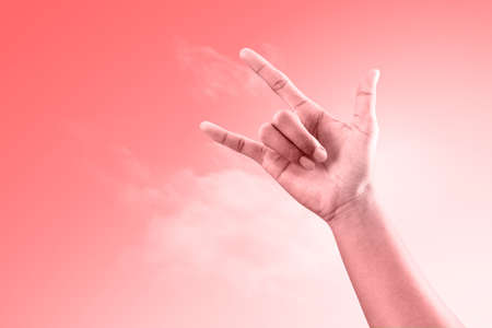Hands make love sign with romance background and Happy Valentine day.
