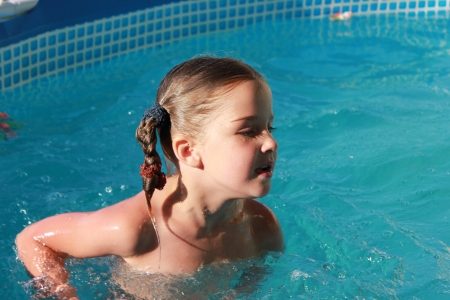 child in poolの写真素材