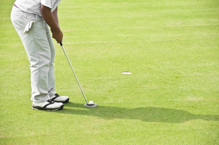 Golfer putting の写真素材
