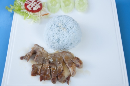 Grilled pork Korean style with rice の写真素材