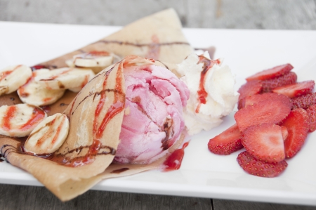 Strawberry banana crape with ice cream の写真素材