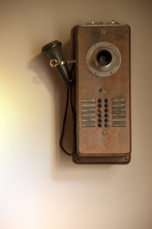 Antique telephone with art lighting effect の写真素材