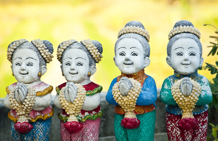 Sawasdee, Thai children stucco doll salute の写真素材