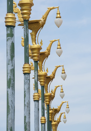 Thai art swan on lamp post の写真素材