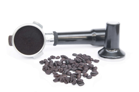 Coffee beans and coffee making equipment isolated の写真素材