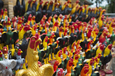 Fighting cock offer to King Naresuan's shrine, traditional worship in Thailand.の写真素材