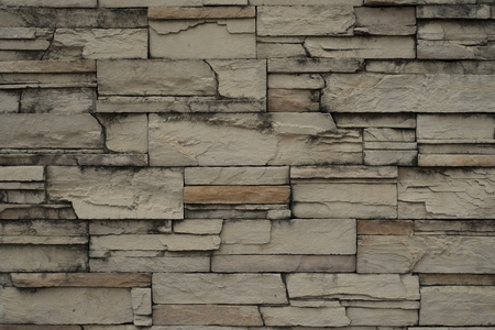 Modern slab stone wall as background.の写真素材