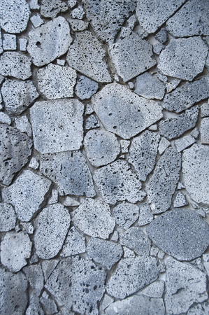 Volcanic rock or Lava rock wall as background.の写真素材
