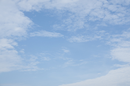 Clouds and blue sky with space for design background.の写真素材
