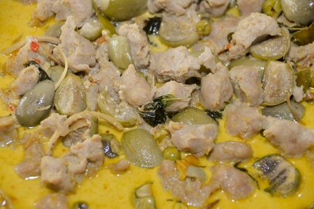 Thai style spicy fish meatball in green curry with coconut milk.の写真素材
