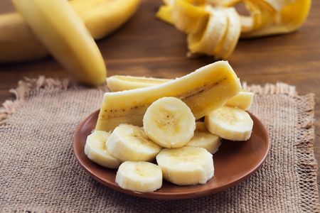 Sliced ripe banana in a round plate.の写真素材