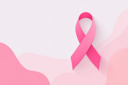 The pink ribbon, a symbol of breast cancer awareness, is artistically displayed on a gentle pink backdrop, conveying a message of hope and solidarity for survivors and supporters. Cancerの素材