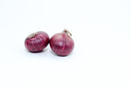 purple onion isolated on a white backgroundの写真素材