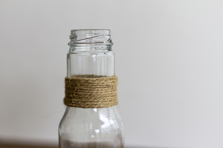 glass bottles decoration on a wooden tableの写真素材