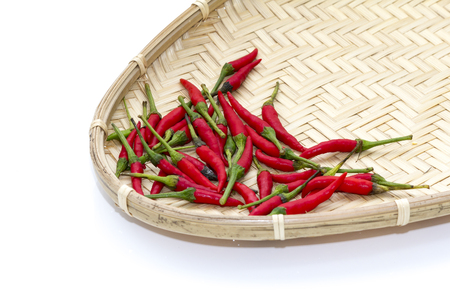red chillies in a wicker basketの写真素材