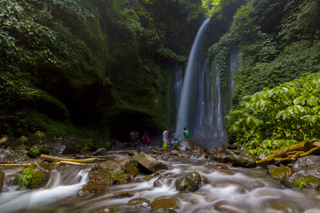 LOMBOK, INDONESIA: Tiu Kelep waterfall in Senaru, Lombok, Indonesia. Too many tourists from abroad.の写真素材