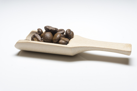 coffee beans and wooden spoon.の写真素材