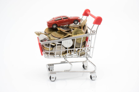 shopping concept, trolley, coin and toy carの写真素材