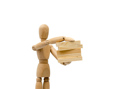 Business concepts, robots carry wooden blocks.の写真素材