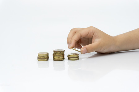 children's hands arrange ceiling coins