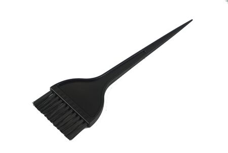 black hair comb with white backgroundの写真素材