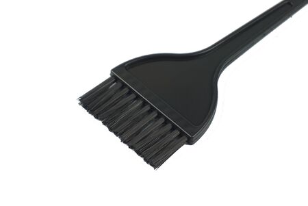 black hair comb with white backgroundの写真素材