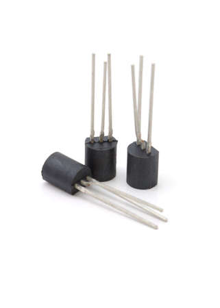Three of a some electronic element (transistors or triods) on a white background