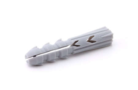 Single plastic dowel on a white backgroundの写真素材