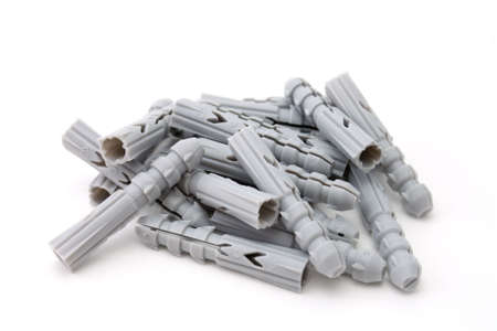 Heap of a plastic dowels on a white backgroundの写真素材