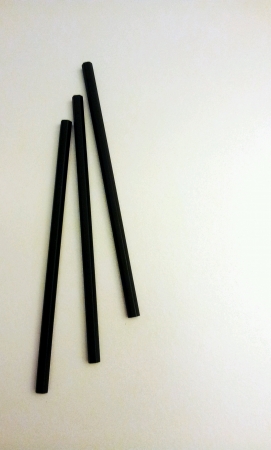 Three black pencils isolated