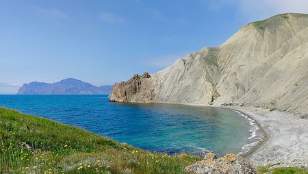 Majestic mountains and blue seaの写真素材
