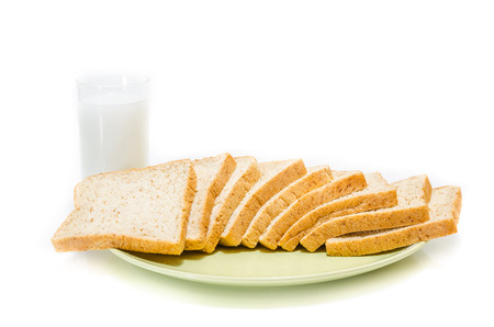 Bread with milk on white Studio shot