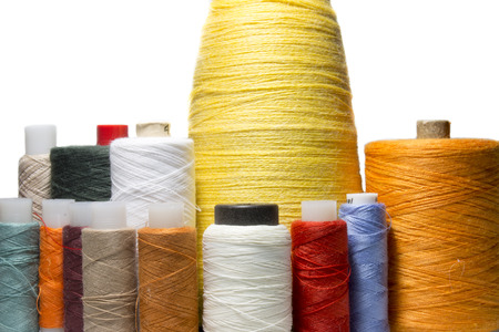 sewing thread isolated over whiteの写真素材